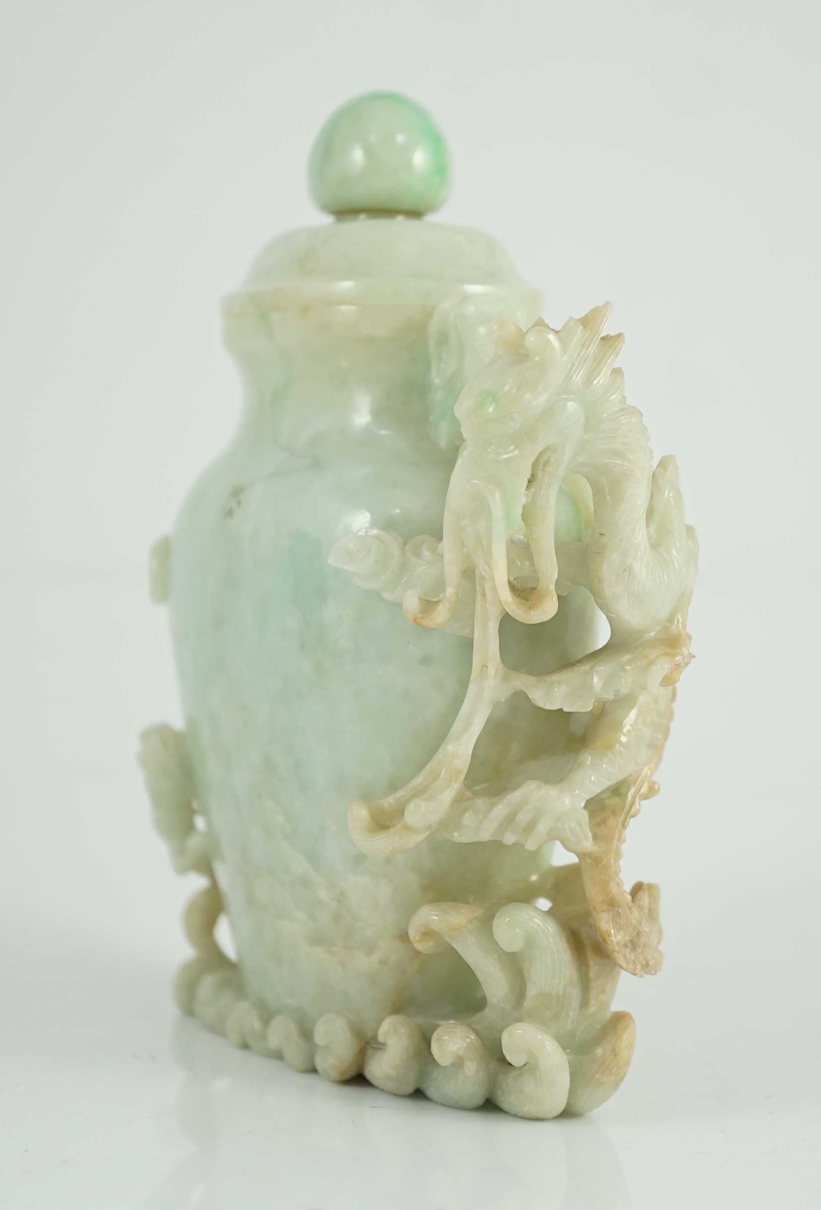 A Chinese jadeite 'dragon' vase and cover, late 19th/early 20th century, 15.3cm high, horn tips and one ring lacking